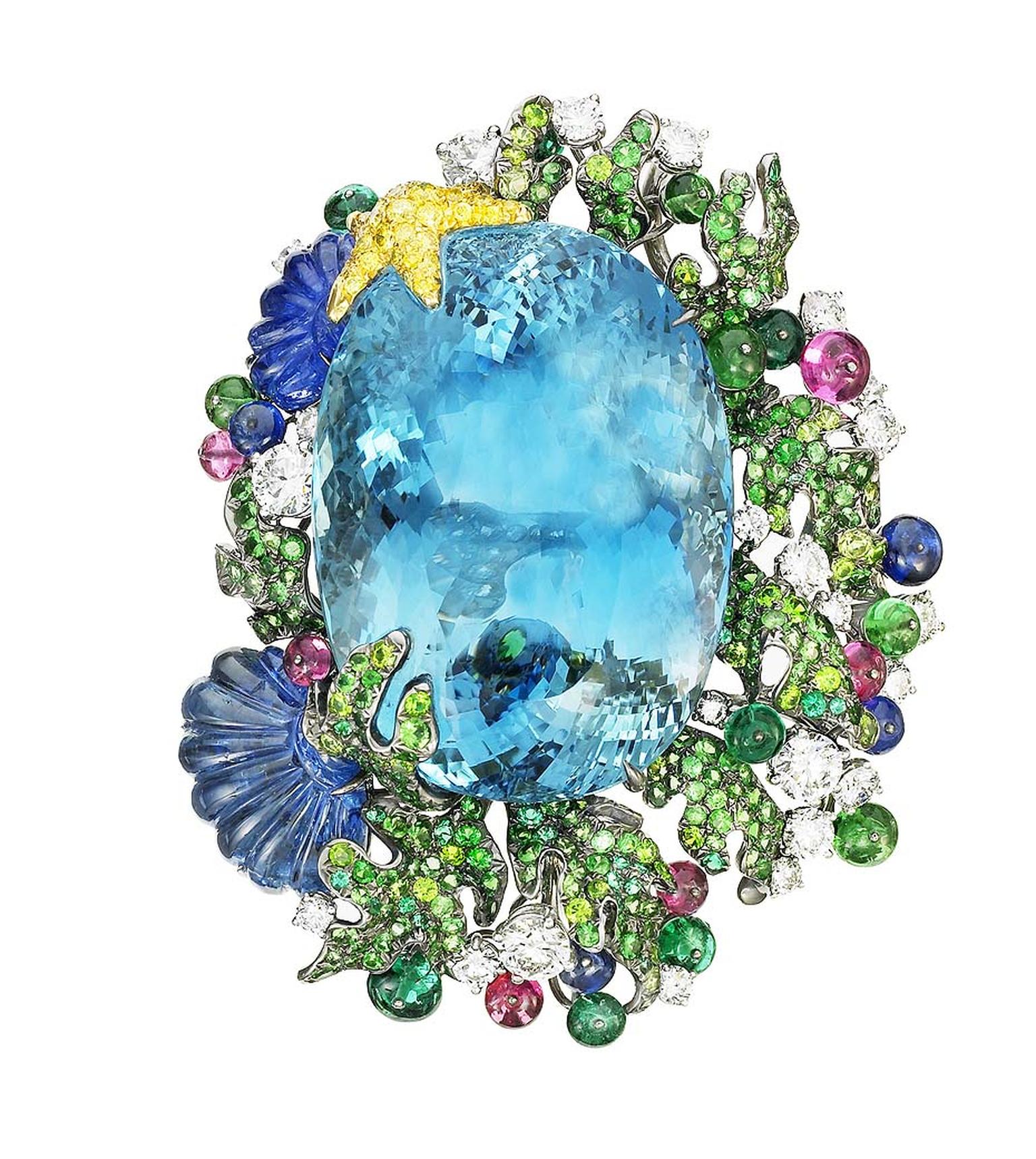 Anna Hu Siren's Aria brooch in white gold, set with a 103.72ct aquamarine, a carved blue sapphire shell, emerald, tsavorite and sapphire beads, diamonds, sapphires and Paraiba tourmalines.