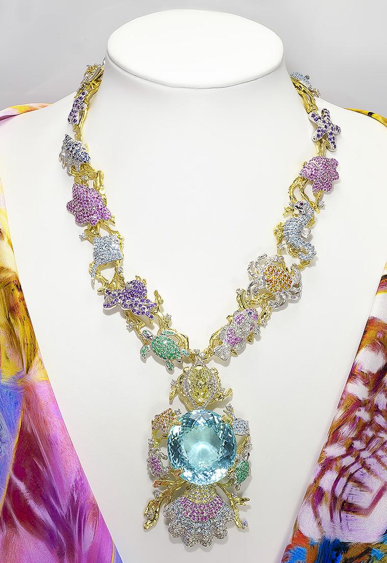 Record breaking Paraiba tourmaline is set into a one of a kind necklace before it heads to auction in 2014
