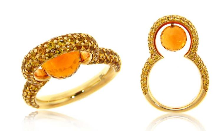 Michael John Jewelry yellow gold pearl ring with a 2.74ct faceted sapphire and pavé citrine (US$5,300).