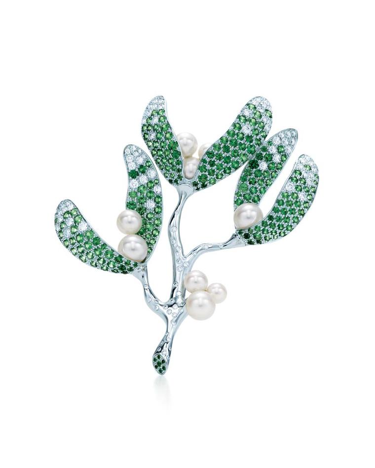 Tiffany & Co. Mistletoe brooch in white gold, with diamonds, tsavorites and South Sea pearls ($53,000).