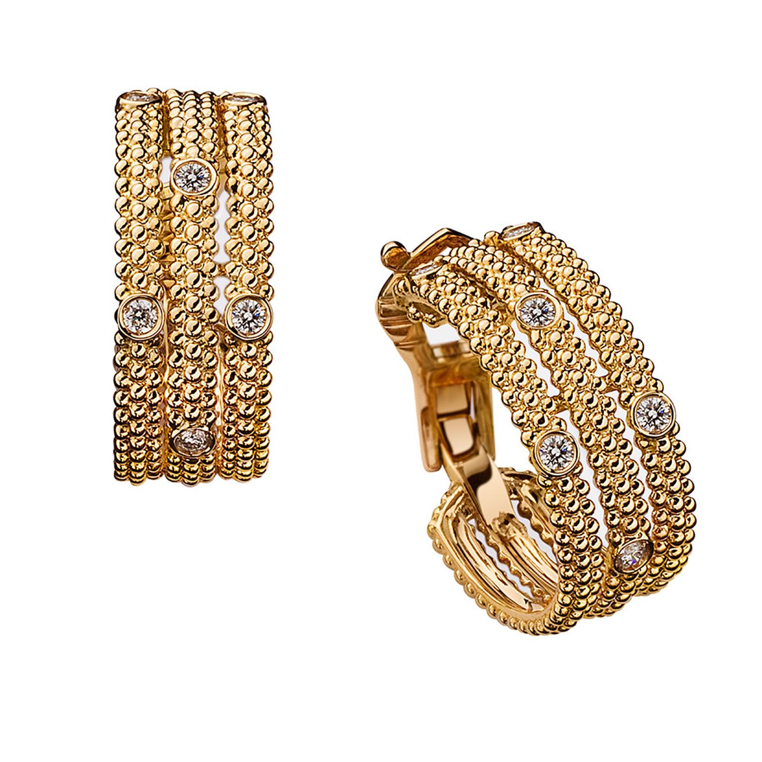 Mauboussin Le Premier Jour earrings in yellow gold, set with asymmetrical diamonds ($2,900).