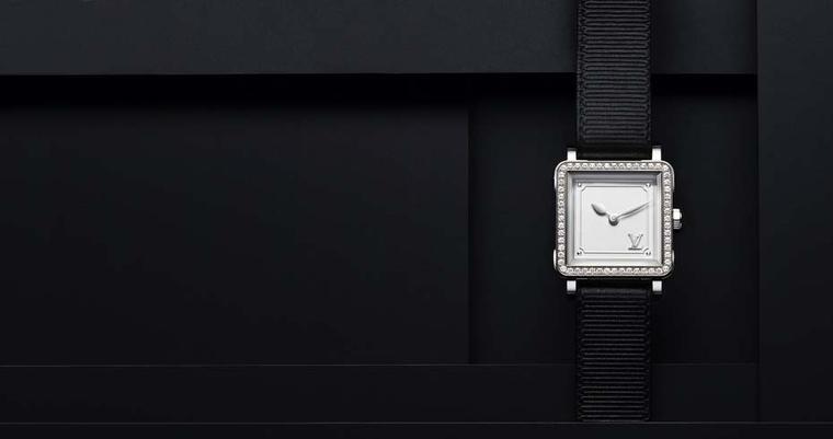 Louis Vuitton Emprise watch in steel, set with 64 diamonds, a silver opalescent dial and a black calfskin strap with gros-grain pattern.