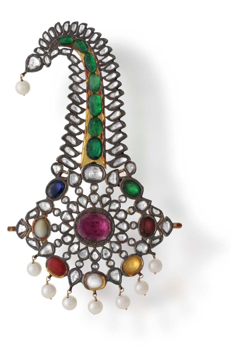 A sacred combination of nine gemstones called a Navratna decorate this Hazoorilal sarpech.