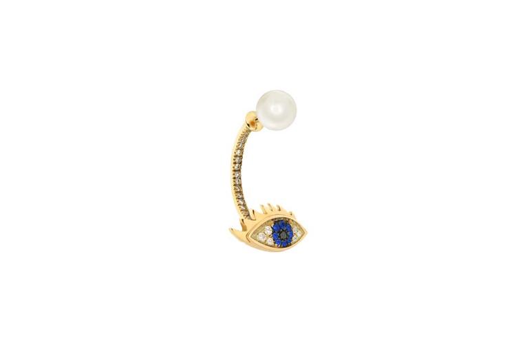 Delfina Delettrez Eye Piercing earring featuring gold, diamonds, light blue sapphires, a black diamond and a pearl. Available at Dover Street Market (£1,450).