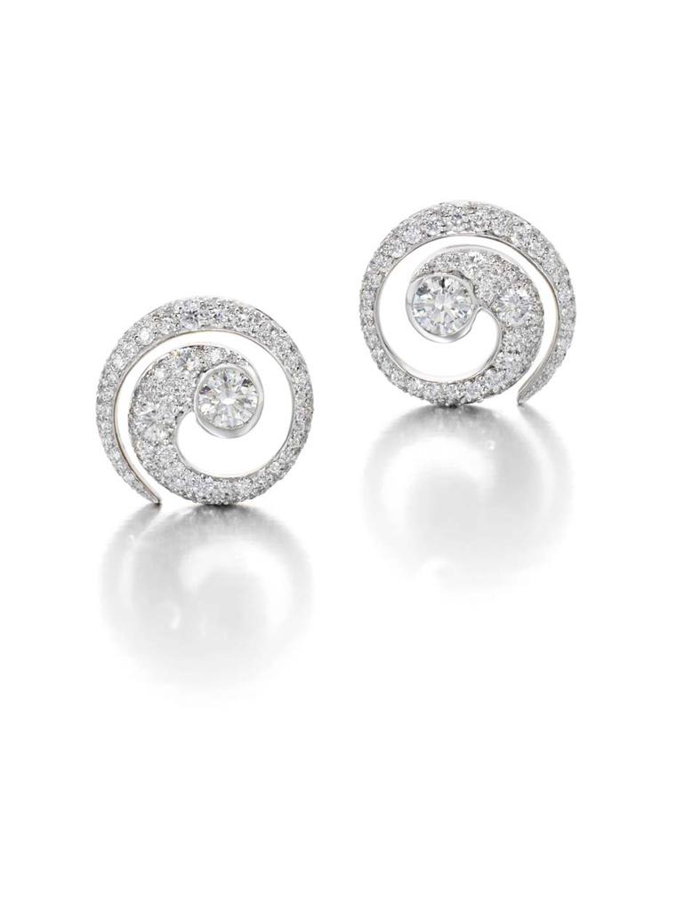 Jessica McCormack mini diamond Tattoo earrings.