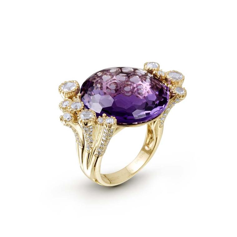 Farah Khan Crow ring with a central amethyst surrounded by diamonds, rubies and emeralds, set in rose gold