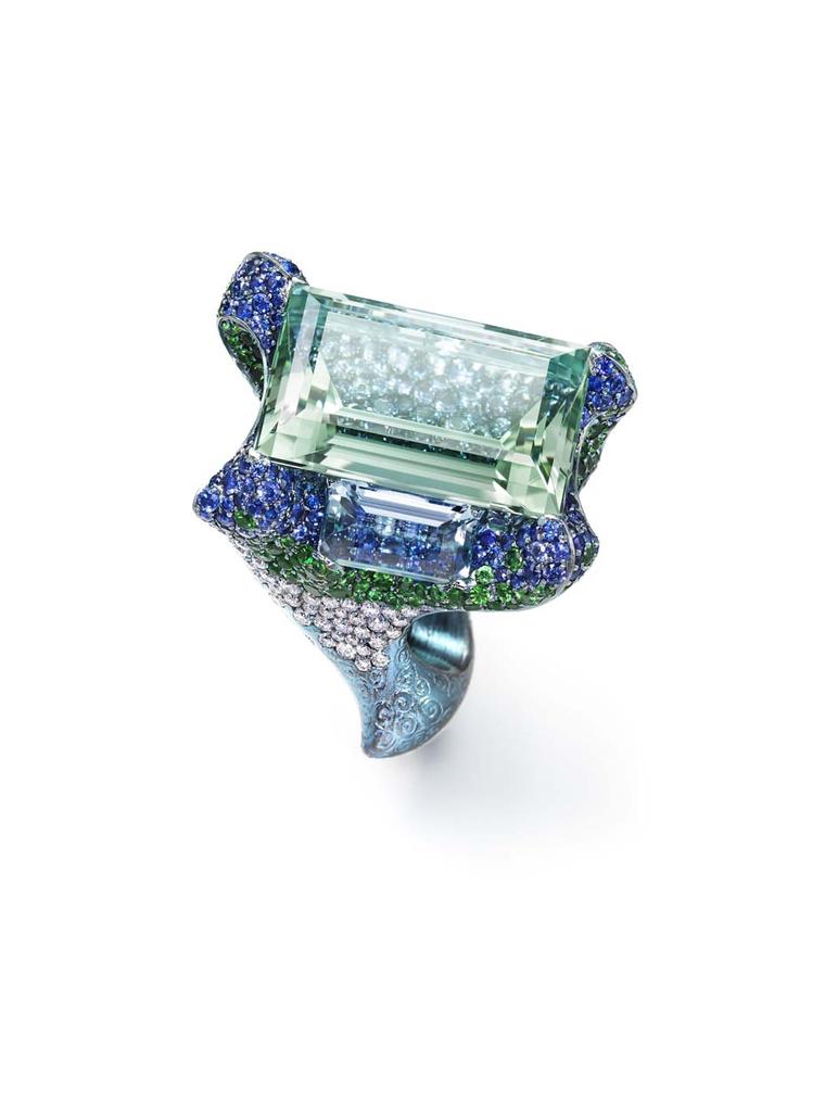 Wallace Chan Cloudless Climes ring set with a central 31.13ct aquamarine and two additional aquamarines, diamonds, tsavorites, garnets and sapphires