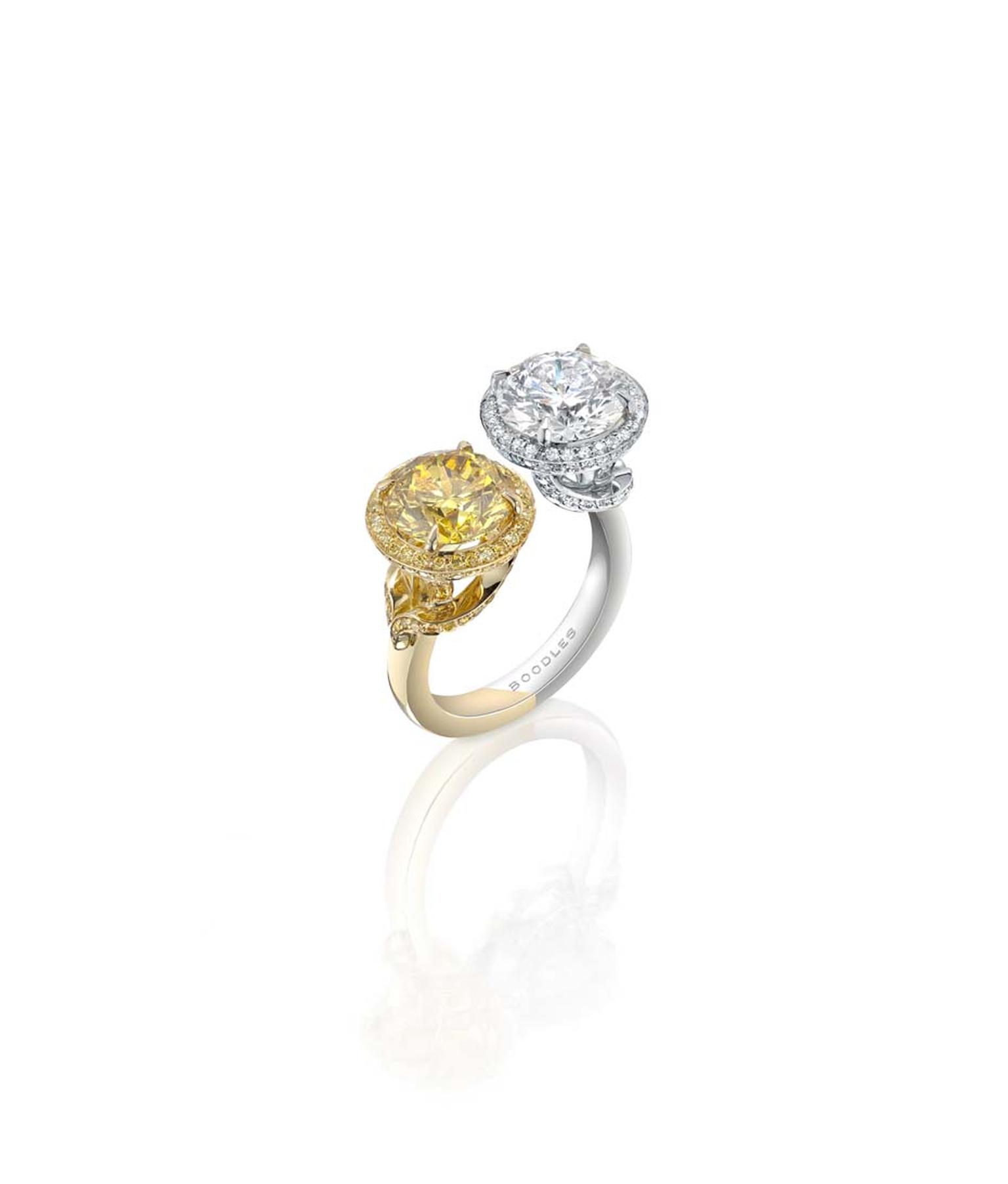 Boodles Gemini yellow and white gold ring set with a 3ct natural Fancy Vivid yellow diamond alongside a 3ct white diamond