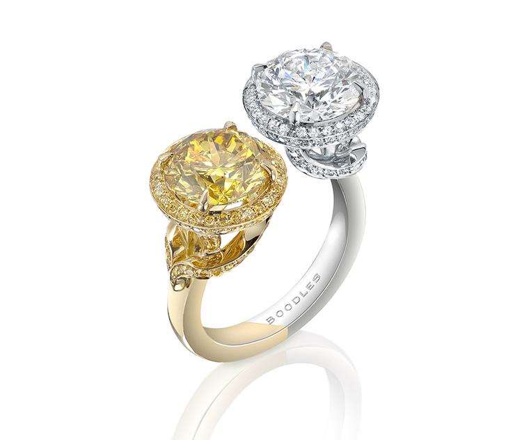 Boodles Gemini yellow and white gold ring set with a 3ct natural Fancy Vivid yellow diamond alongside a 3ct white diamond