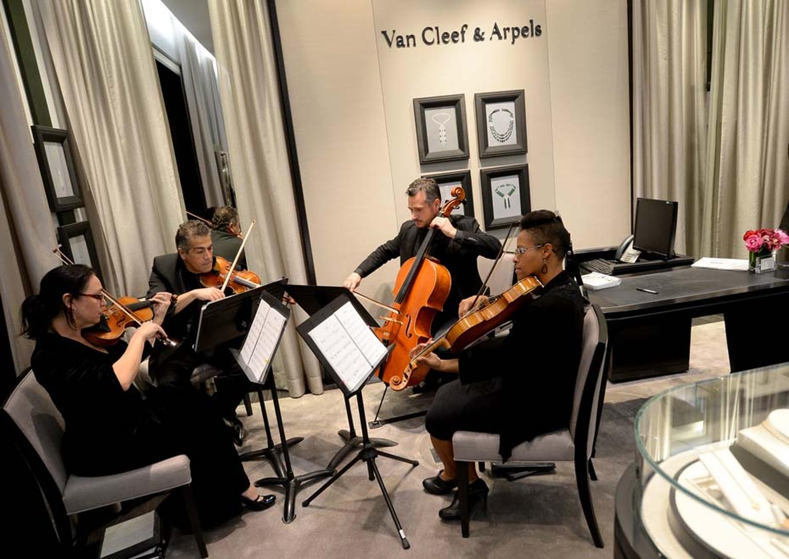 VIP guests enjoyed champagne and a string quartet performance