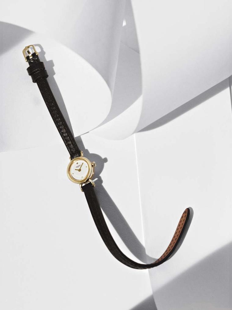 Hermès Faubourg watch with a yellow gold case and black Box calf strap