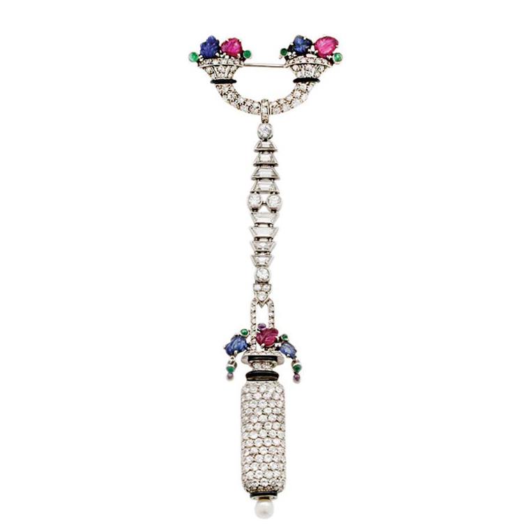 Art Deco Tutti Frutti diamond pendant watch by Lacloche Freres from Bentley & Skinner on 1stdibs