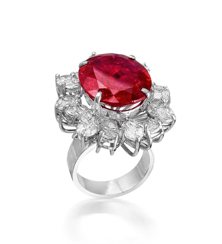 Varuna D Jani cocktail ring with diamonds surrounding a brilliant-cut ruby