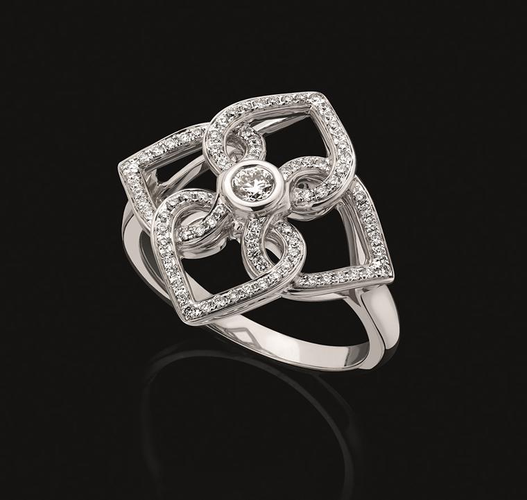 Backes & Strauss Four Heart ring featuring interlocking hearts set with 429 ideal cut round brilliant diamonds