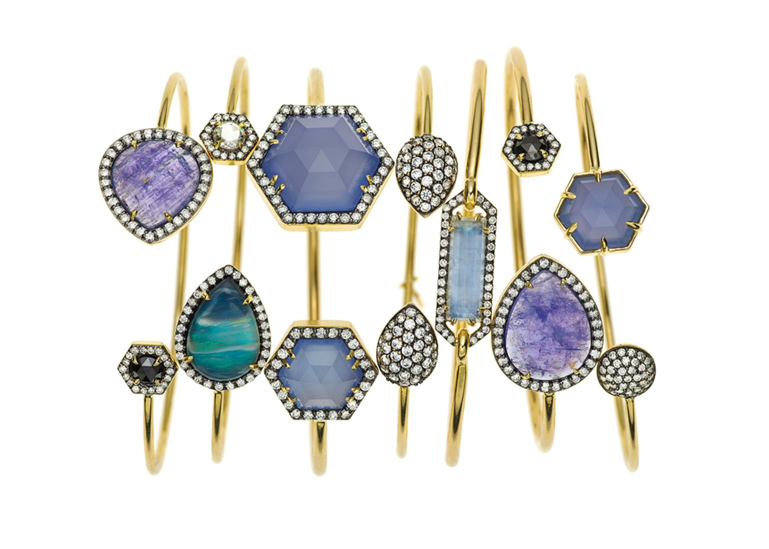 Jemma Wynne yellow gold bangles with tanzanite, boulder opal, blue chalcedony, rainbow moonstone and rose-cut black diamonds