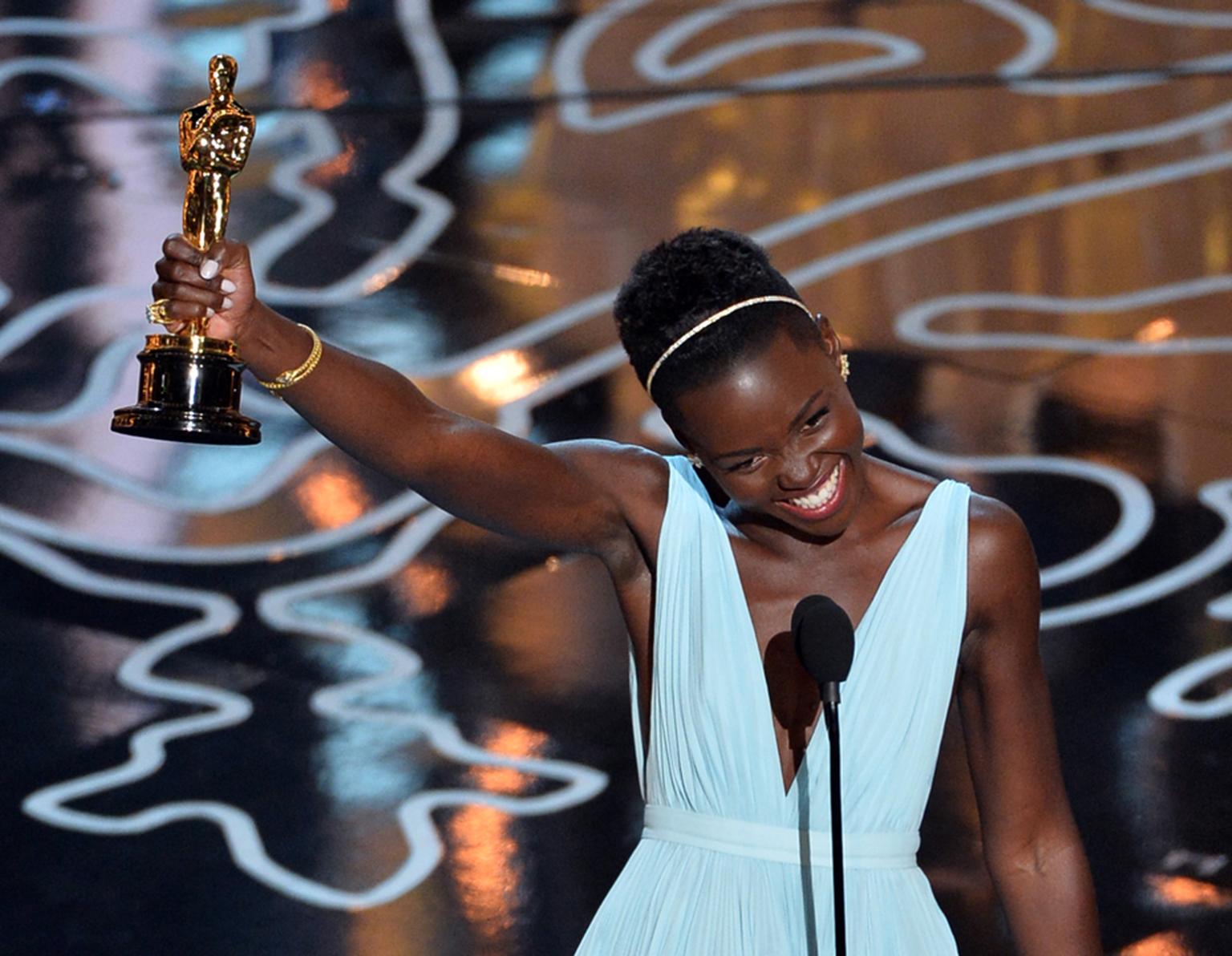 Oscar winner Lupita Nyong'o also chose a delicate Fred Leighton 19th century gold and diamond snake bracelet, a trio of vintage rings and a gold Frog ring, which she described as her "family totem"