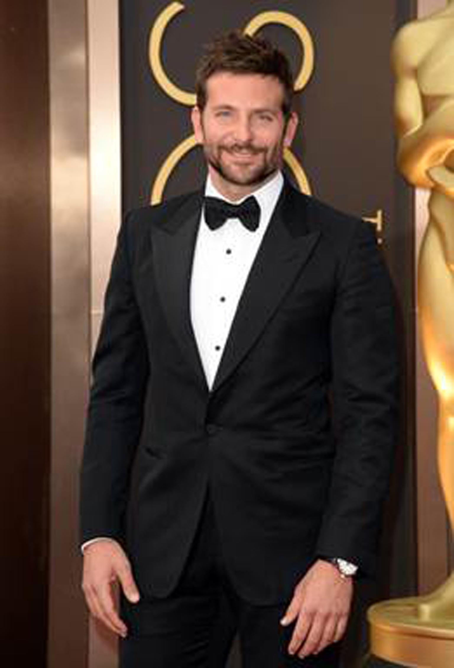 Nominated for Best Actor in a Supporting Role, Bradley Cooper selected Chopard’s L.U.C 1937 stainless steel Classic timepiece featuring a white dial and black alligator strap.