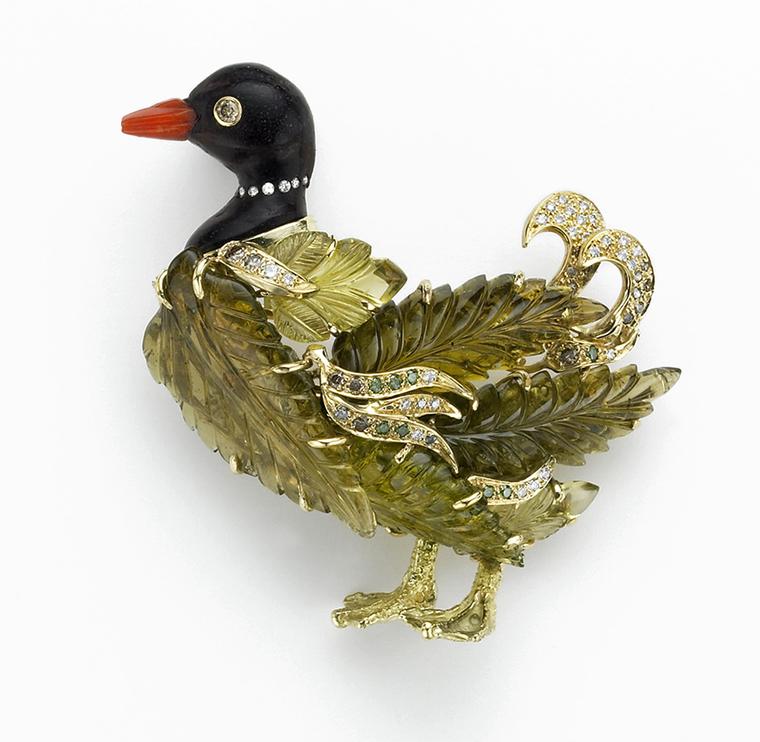 Sorab & Roshi Lame Duck pin with carved green tourmaline & lemon citrine feathers, pavé green, champagne & white diamonds, an ebony wood head and coral beak
