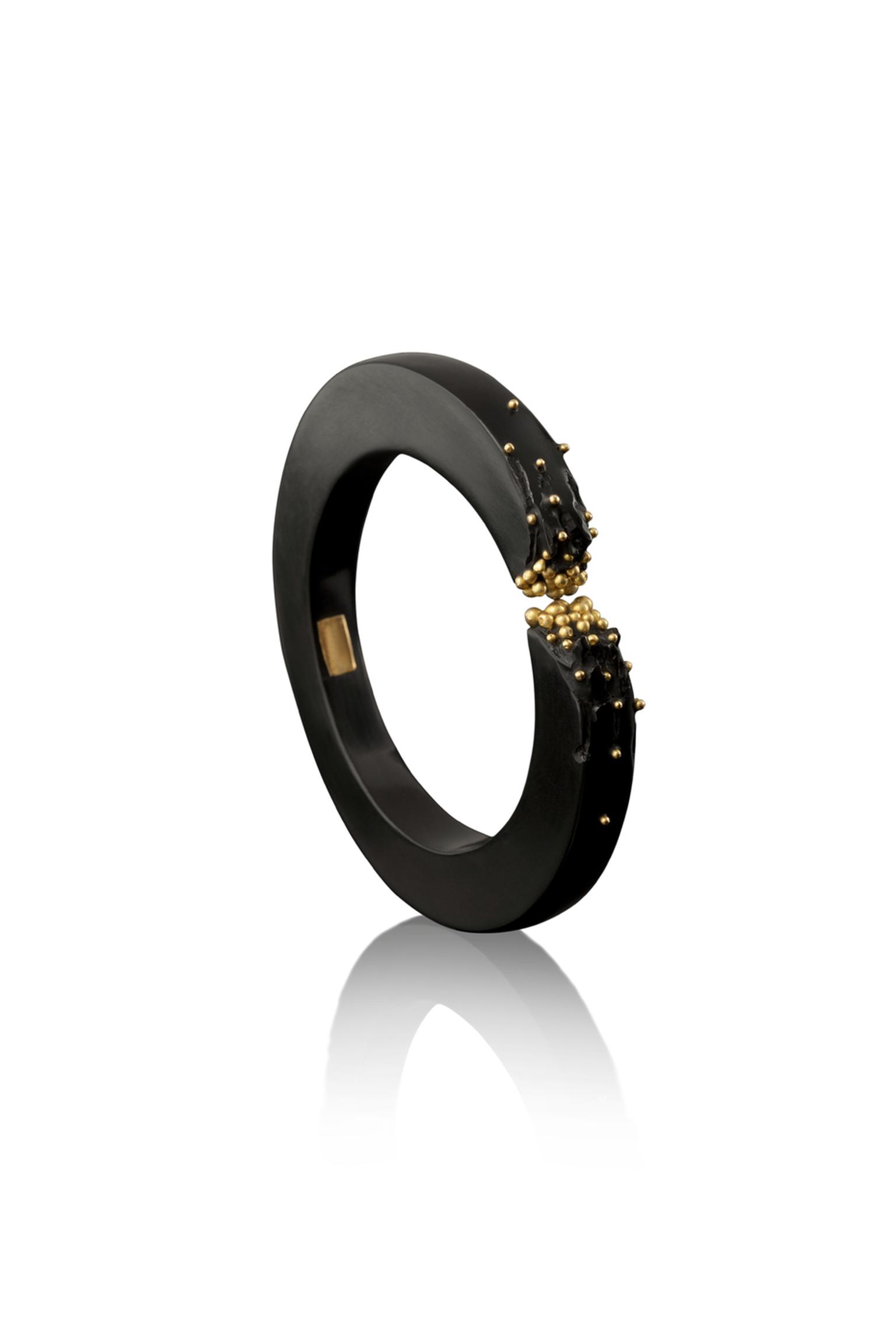 Limited-edition Jacqueline Cullen hand-carved Whitby Jet gold granulated bangle.