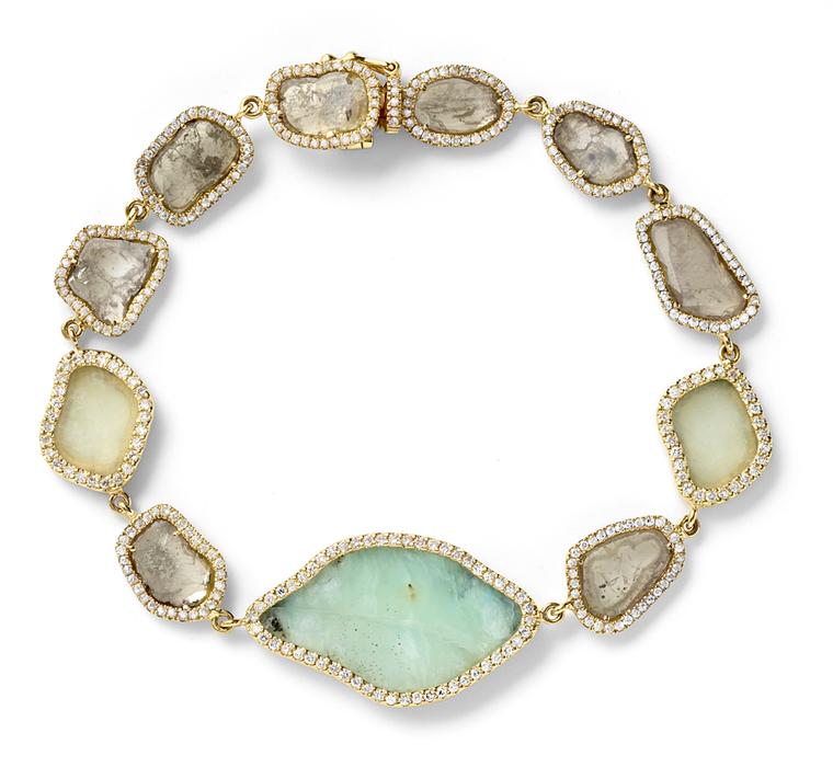 Monique Péan bracelet featuring cream fossilized woolly mammoth ivory, opal and serpentine surrounded by diamonds set in gold.