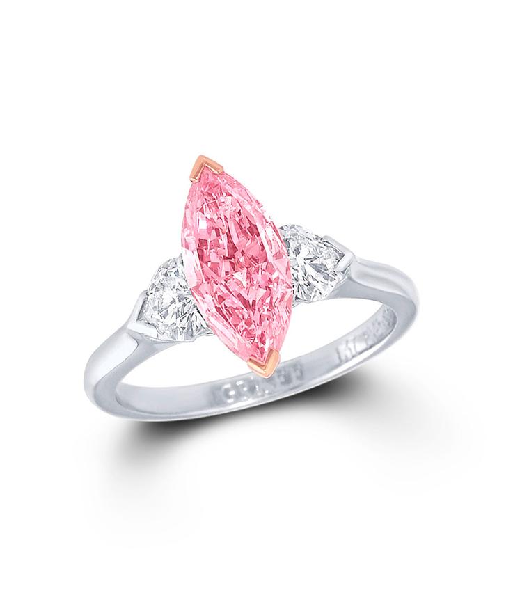 Graff marquise-cut pink centre diamond ring featuring two white diamonds.