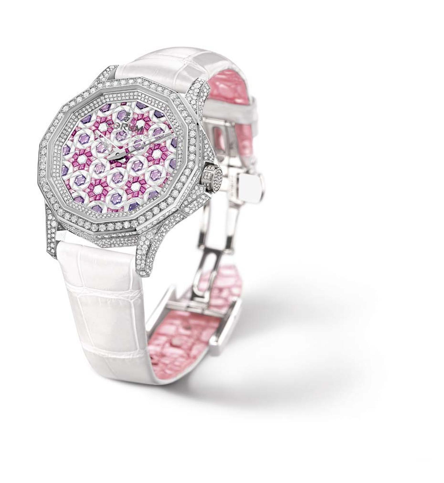 Corum 12-sided Admiral's Cup Legend 38 for women is adorned diamonds and pink and purple sapphires, set to create a tightly packed geometric floral motif