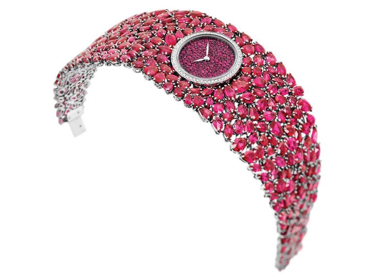 DeLaneau Grace Rubies jewellery watch in white gold, set with 284 rubies on the bracelet and 58 diamonds on the case. The oval dial is set with a further 210 rubies
