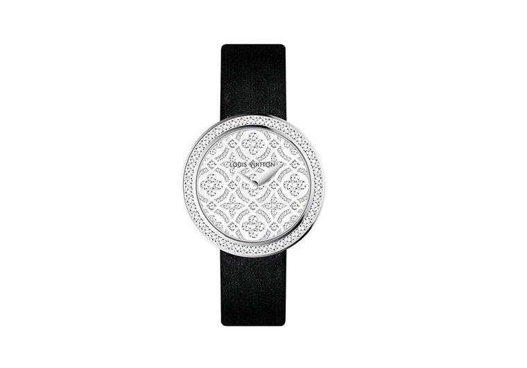 Dentelle de Monogram watch with a pearly white mother-of-pearl dial set with diamonds featuring the iconic Louis Vuitton flowers and stars motif, surrounded by a diamond-set bezel, and black satin strap