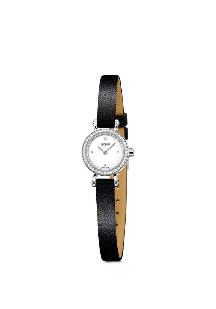 Hermès Faubourg watch featuring a diamond bezel.