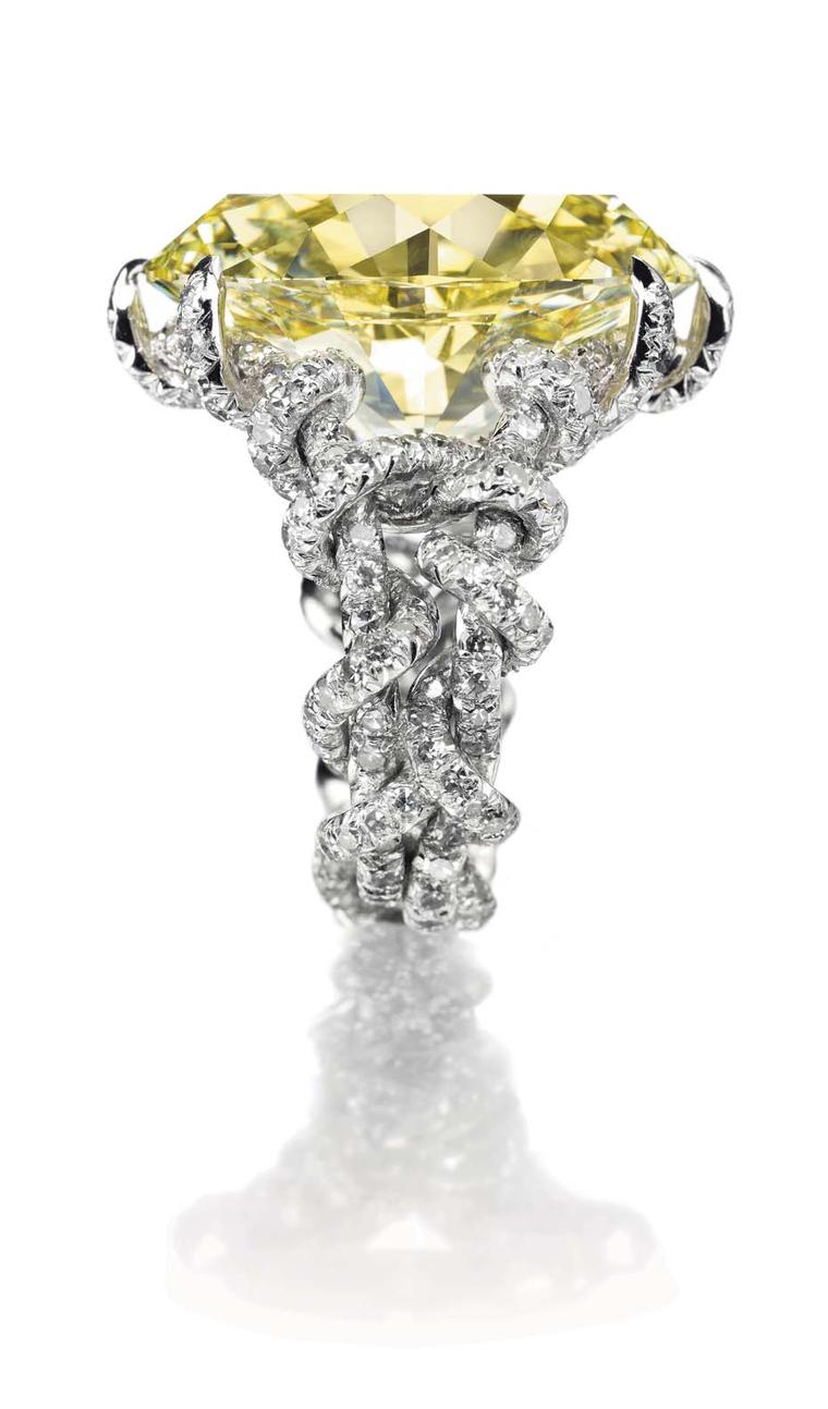 Lot 226, a coloured diamond and diamond ring by JAR, set with an oval-cut fancy intense yellow diamond weighing approximately 15.75ct, mounted in platinum (estimate: US$500-700,000)