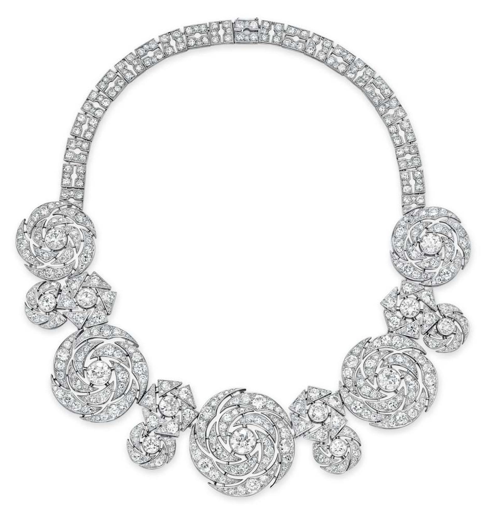 Lot 230, a diamond necklace by Cartier, designed a a series of graduated openwork old European and single-cut diamond swirling plaques in platinum, circa 1942 (estimate: US$450-650,000)