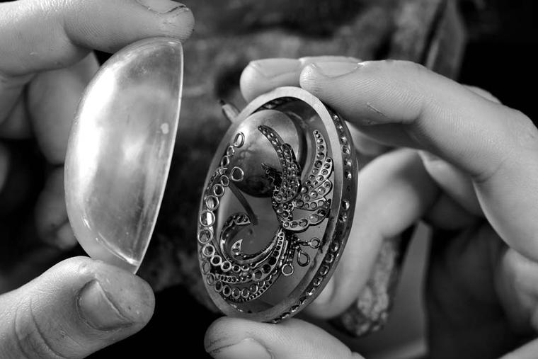 The three-dimensional rock crystal dome, carved from a solid piece of rock crystal, is a window into Boucheron's extraordinary Cristal de Lune jewellery watch