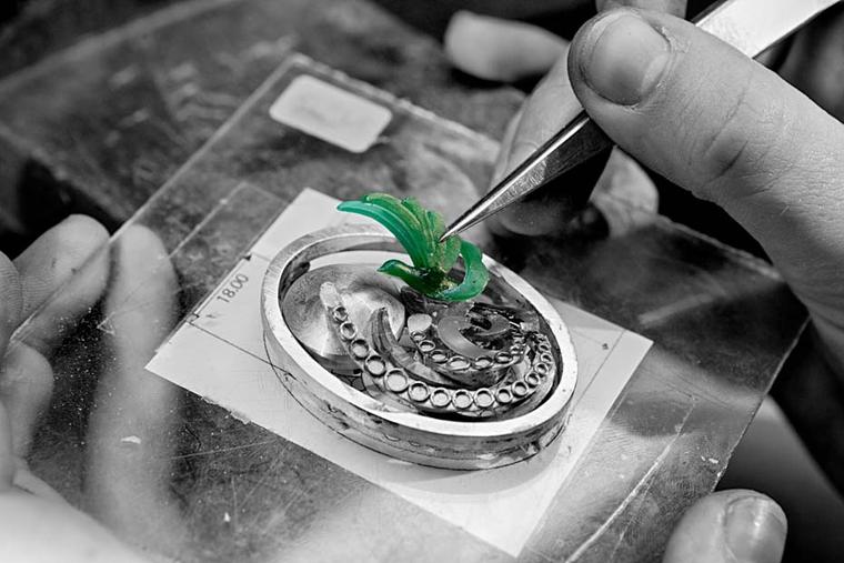 A three-dimensional prototype of the Paon de Lune - or moon peacock - is put in place to ensure the perfect fit before it is crafted in white gold
