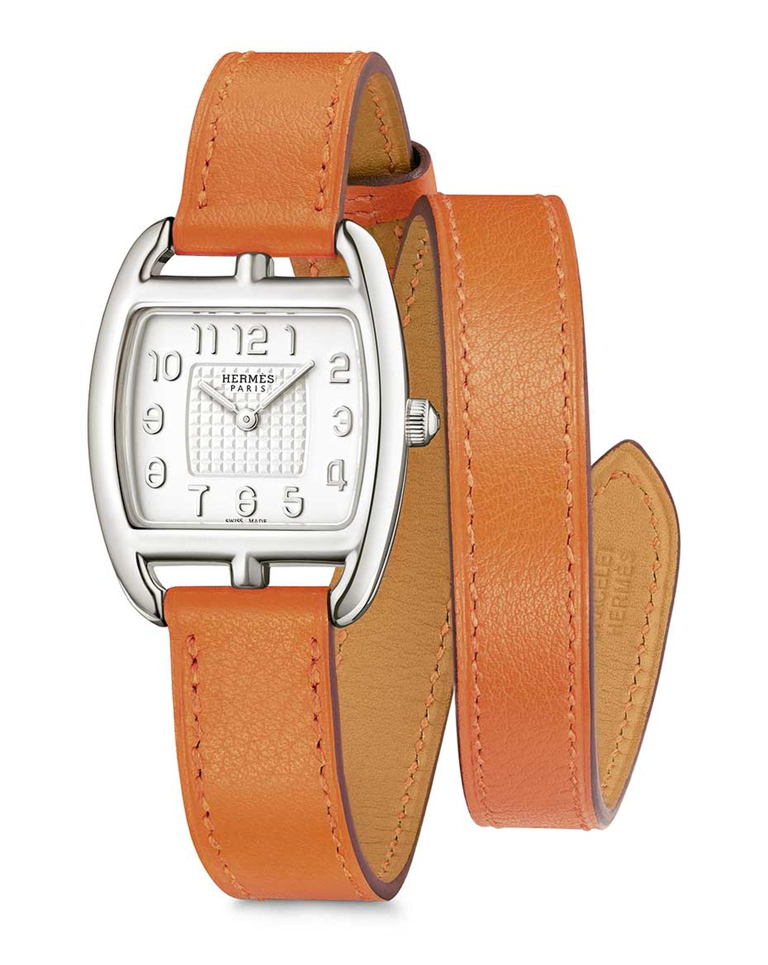Also new for 2014 is the Hermès Cape Cod Tonneau in silver, with a double orange leather strap