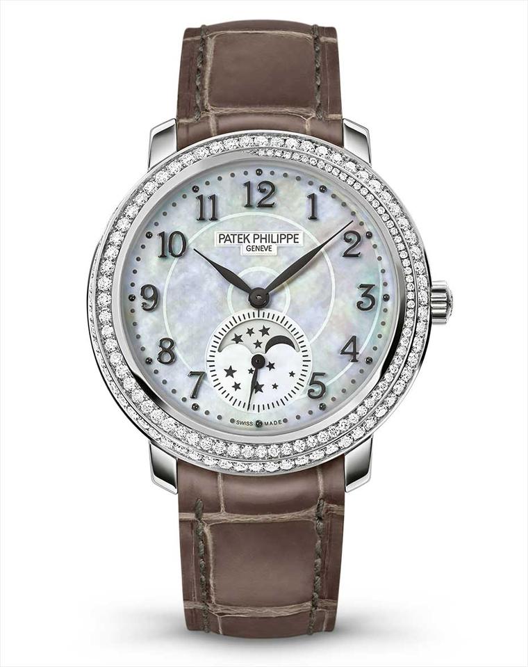 Entrancing us with its iridescent white mother-of-pearl dial and cool white gold case, set with diamonds, is the new Ref. 4968G-010 from Patek Philippe's collection of three mother-of-pearl Moon phase watches