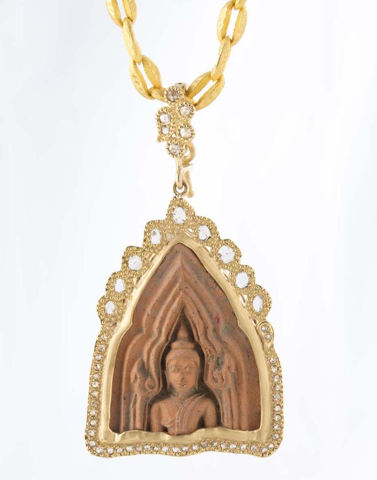 Coomi Buddha necklace in gold with diamonds.