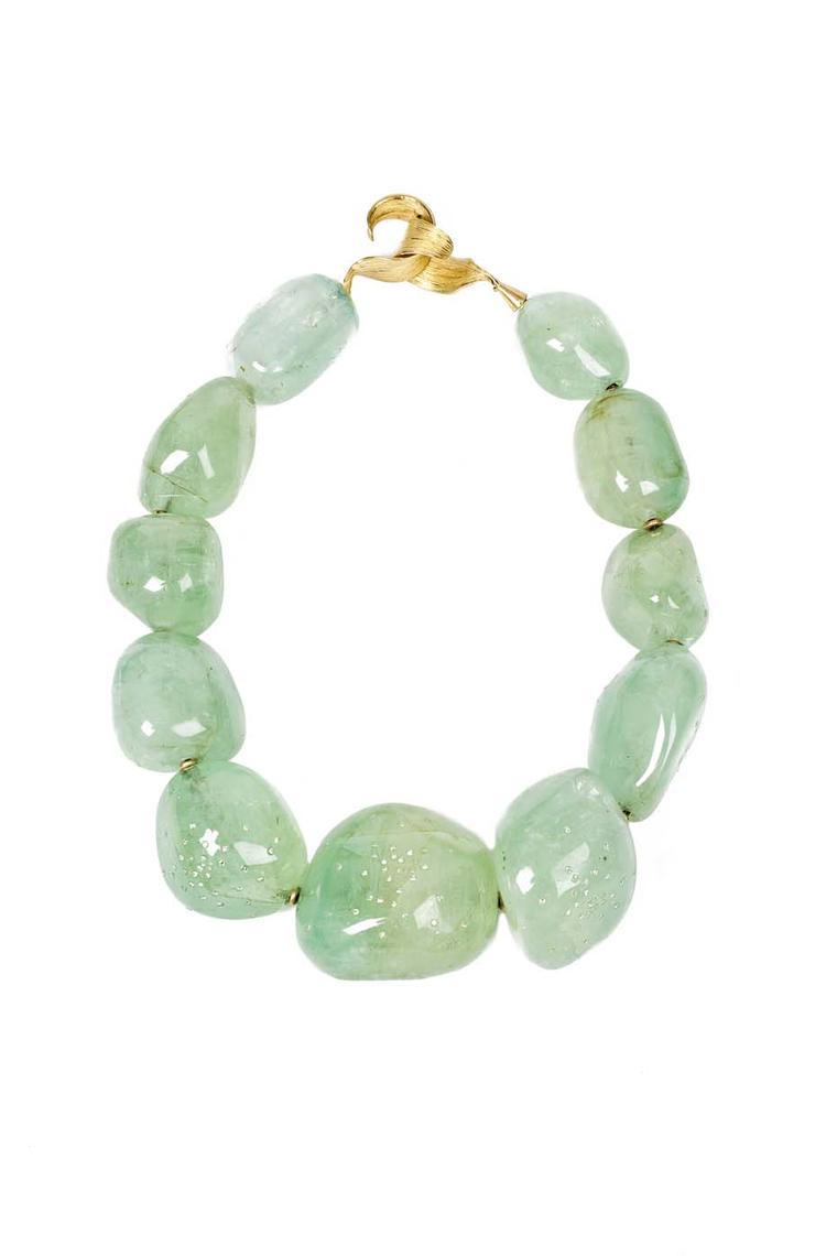 Gurmit Campbell Among Heavenly Bodies gold necklace featuring diamond encrusted pale emerald.