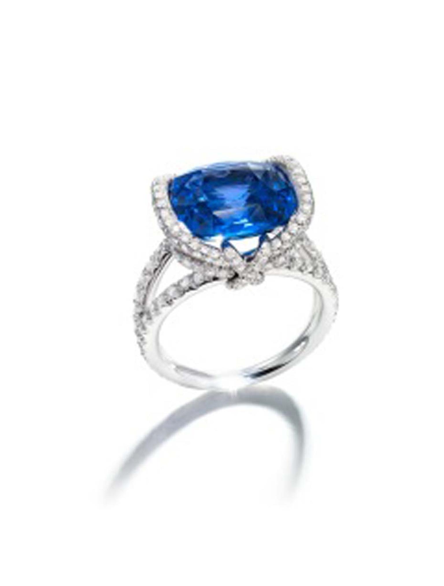 Chaumet Liens ring with a centre sapphire surrounded by diamonds.