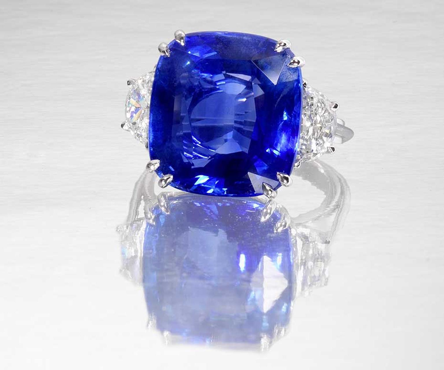 Lot 190, a Burmese sapphire and diamond ring. The cushion-shaped sapphire weighs 22.18ct, flanked on either side by demi lune-shaped diamonds. Sold for £326,500 (estimate: £175,000-200,000)