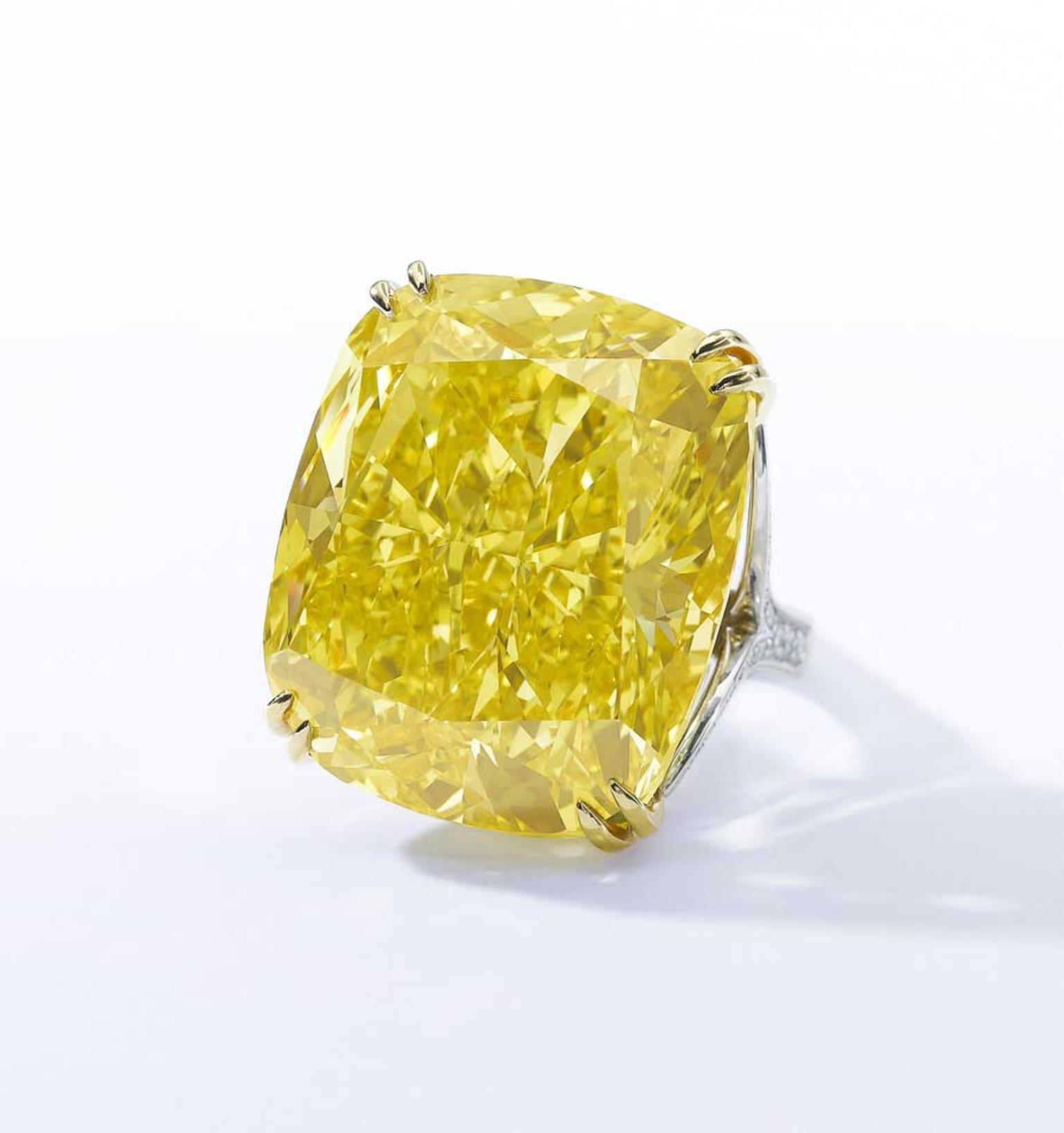 The 100.09 carat Graff Vivid Yellow diamond is one of the largest Fancy Vivid yellow diamonds ever seen. It set a new world auction record for the highest price ever paid for a yellow diamond when it sold for $16.3 million at Sotheby's Geneva on 13 May 20