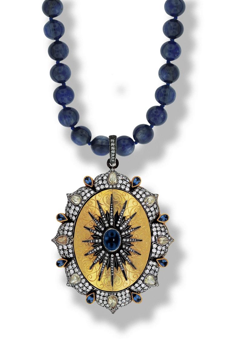 Arman Sarkisyan's award-winning Sacred Heart locket in gold and oxidised silver features an engraved exterior set with sapphires and diamonds on a string of kyanite beads