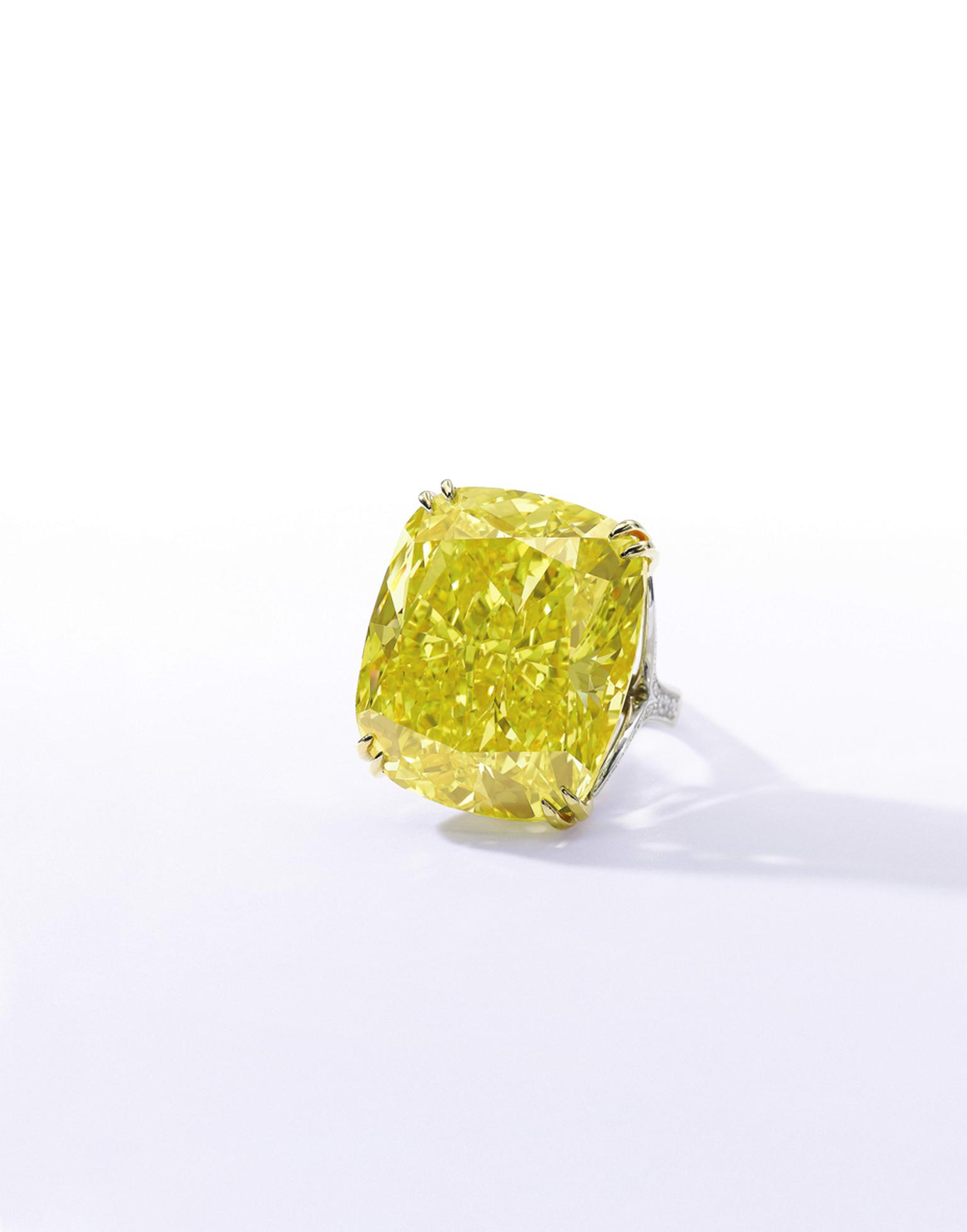 The 100.09ct Graff Vivid Yellow diamond features a Fancy Vivid Yellow, Natural Colour, VS2 Clarity diamond. Sold for CHF 14.5million (estimate: CHF 13.4- 22.3million). Image by: Sothebys.