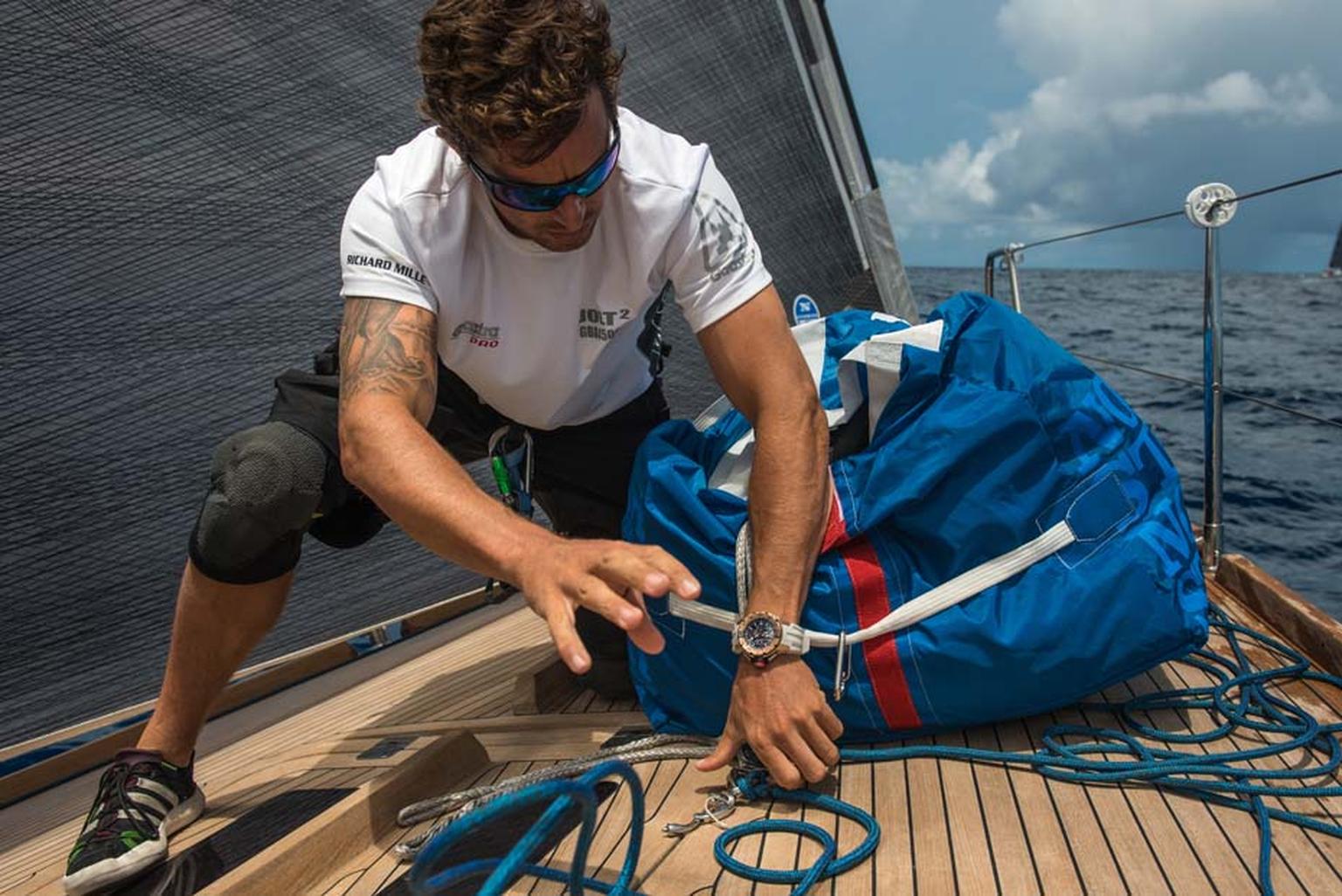 Bowman and captain Adam Davis checks timings on his RM 032 automatic chronograph