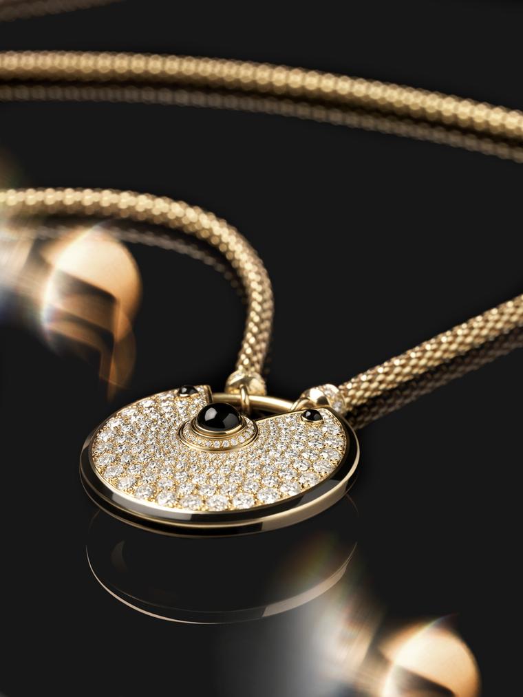 Amulette de Cartier large gold and black lacquer pendant with diamonds and three onyx cabochons