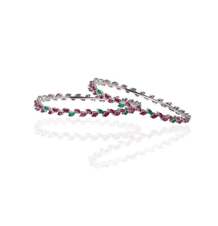 Mirari white gold bangles with marquise-cut rubies and emeralds.