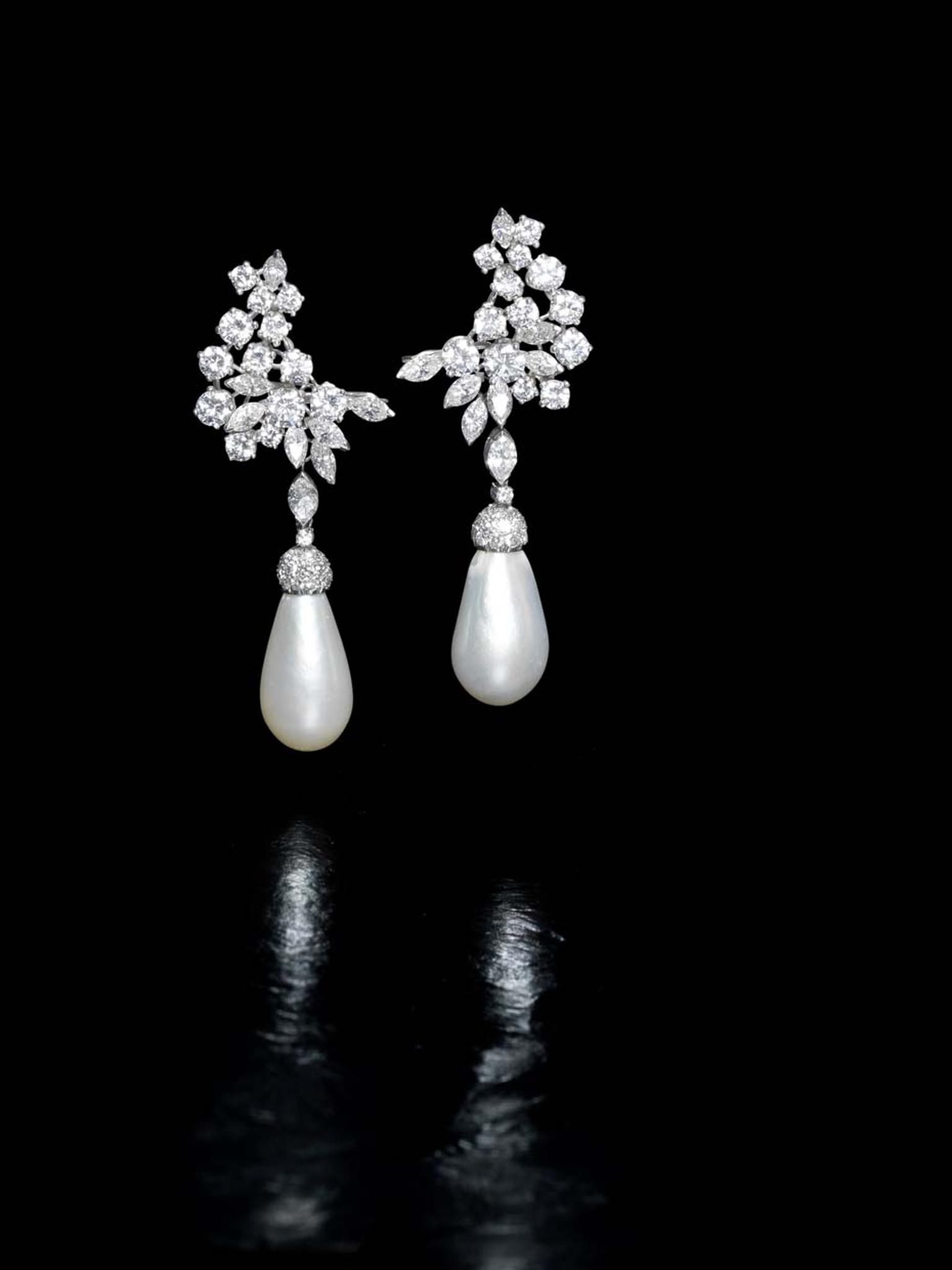 Lot 188, a pair of natural pearl and diamond (6ct) pendant earrings. Sold for £290,500 (estimate: £150,000-200,000)