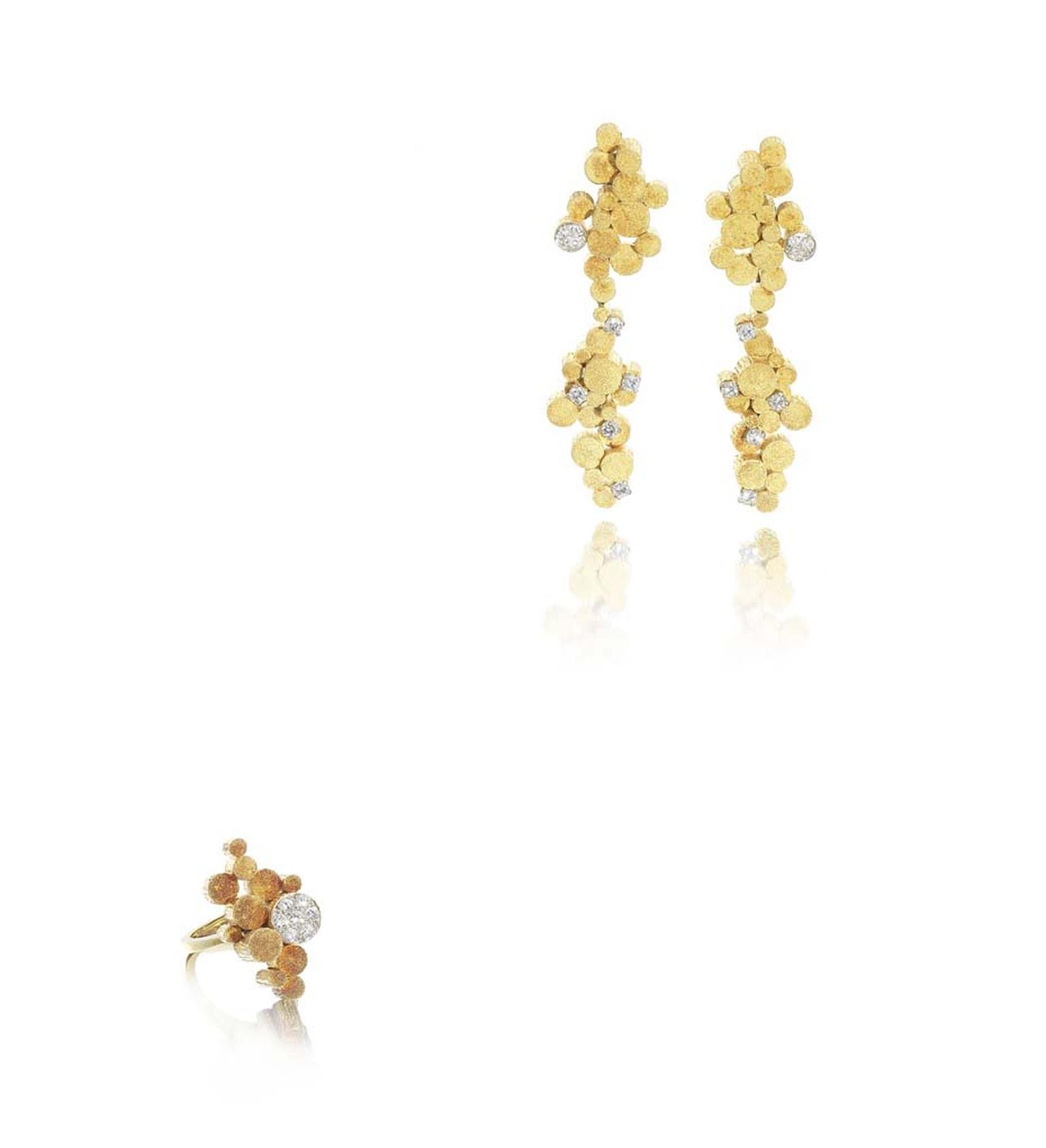 Lot 95, Andrew Grima gold and diamond Night and Day earrings and ring suite. Sold for £15,000 (estimate: £3,000-4,000)