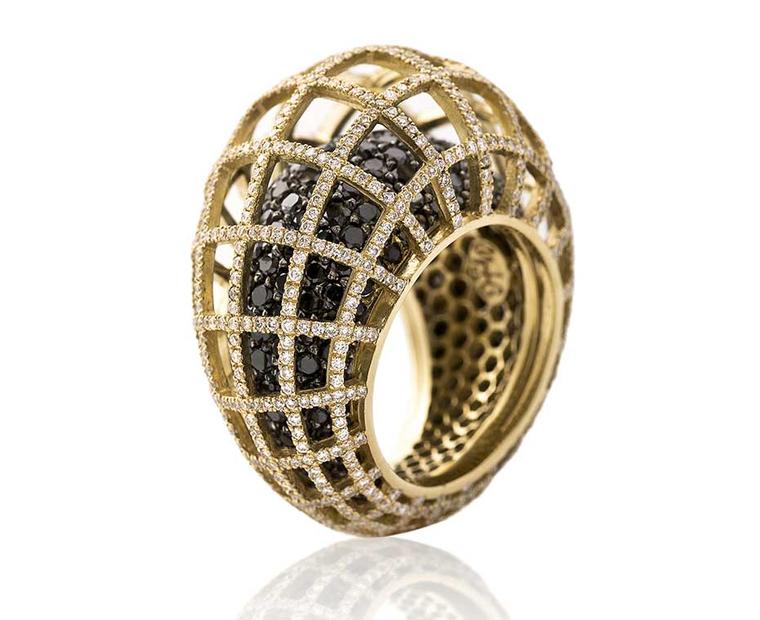 I am looking forward to trying on Nada G's three-dimensional Matrix Double ring in yellow gold with black and white diamonds at the Couture Show Las Vegas