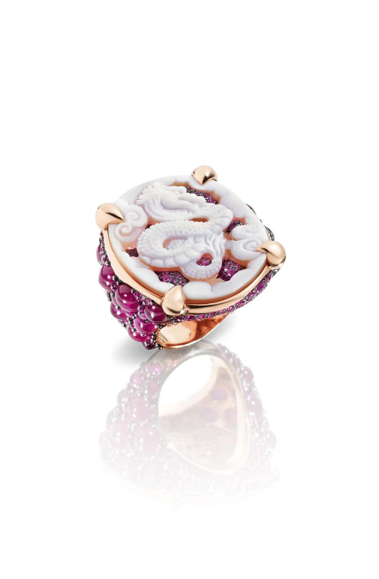 Pomellato Pom Pom Dragon ring in rose gold featuring a band covered with cabochon-cut rubies.
