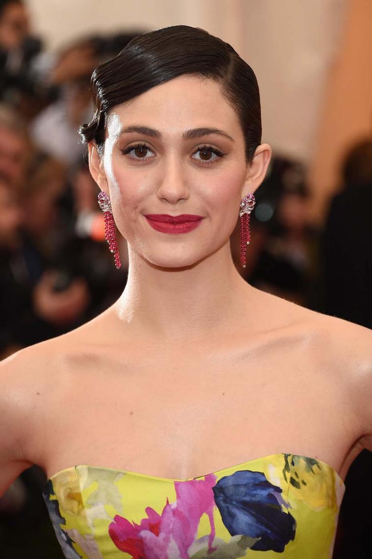 Actress Emmy Rossum teamed an eye-catching floral Carolina Herrera gown with Van Cleef & Arpels "Oiseaux Flamboyant" earrings from the Birds of Paradise collection with red spinels, pink sapphires and diamonds